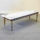 A 20th century French gilt metal coffee table with a marble top