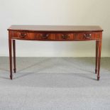 A Regency style bow front side table