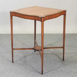 An Edwardian satinwood inlaid occasional table