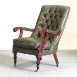 A Victorian style green upholstered button back leather armchair