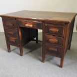 A mid 20th century pedestal desk