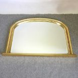 A gilt framed over mantel mirror