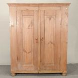 An early 20th century French pine armoire