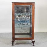 A mid 20th century French perfume cabinet