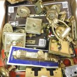 A collection of brass door furniture