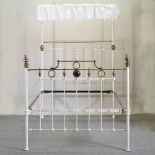A Victorian brass and white painted bedstead