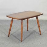 An Ercol elm occasional table