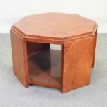 An Art Deco style walnut octagonal coffee table