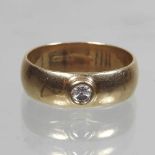 A 9 carat gold and diamond set ring