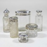 A collection of silver and glass dressing table items