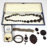 A collection of Victorian and later garnet jewellery