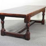 A large oak refectory dining table