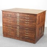 An early 20th century oak plan chest