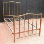 An early 20th century brass single bedstead