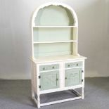 A cream painted dresser