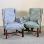A modern blue upholstered wing back chair