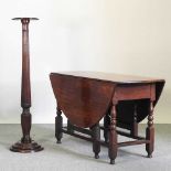 An oak gateleg table