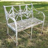 A Regency style white painted cast iron garden bench