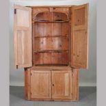 A George III pine standing corner cabinet