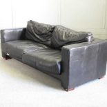 A modern brown upholstered sofa