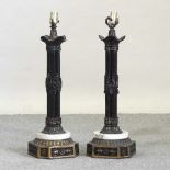 A pair of column style black lamps