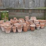 A large collection of terracotta pots