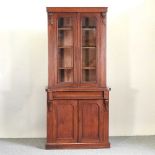 A Victorian mahogany cabinet bookcase
