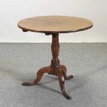 A 19th century oak occasional table