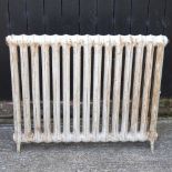 A white painted cast iron radiator