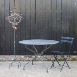 A black painted metal garden table
