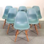 A set of six Vitra Eames moulded plastic dining chairs