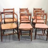 A set of eight 19th century rush seated dining chairs