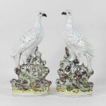 A rare pair of 19th century Staffordshire pottery birds