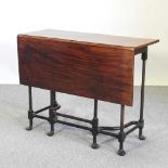 An Edwardian mahogany drop leaf occasional table