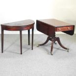 A 19th century mahogany breakfast table