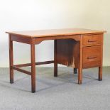A mid 20th century single pedestal desk