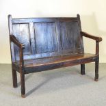 An 18th century and later oak settle