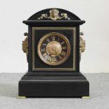 A large 19th century black slate and gilt mounted mantel clock