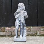 A small 19th century lead garden figure of a boy
