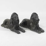 A pair of 19th century lead models of lions