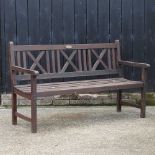 A slatted wooden garden bench