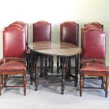 A set of eight red leather upholstered high back dining chairs