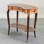 A reproduction kidney shaped marquetry side table