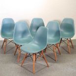 A set of six Vitra Eames moulded plastic dining chairs