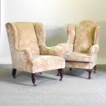 A 1920's wing back armchair