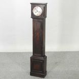 A 1930's oak cased granddaughter clock