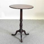 A George III carved mahogany wine table