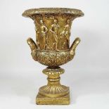 A gilt decorated Grecian style vase