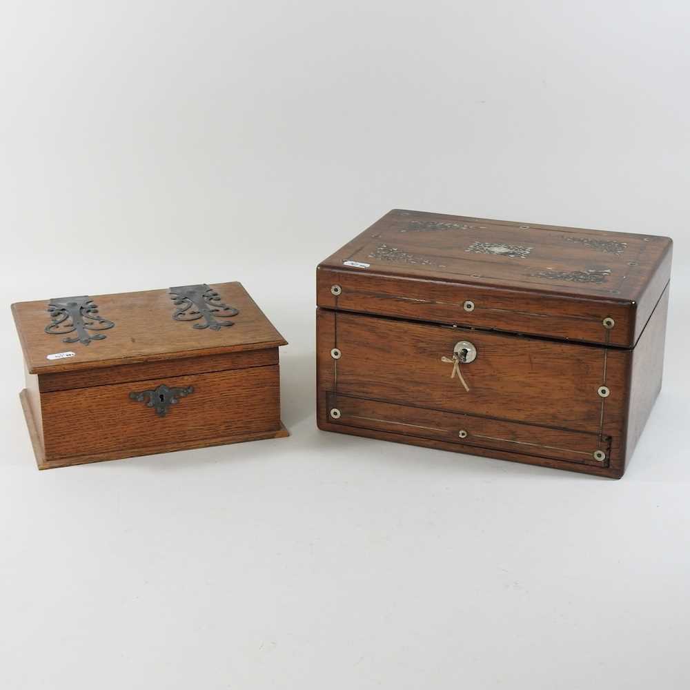 A Victorian rosewood and mother of pearl inlaid vanity case