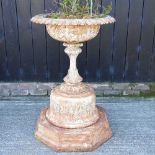 A 19th century white painted cast iron garden urn